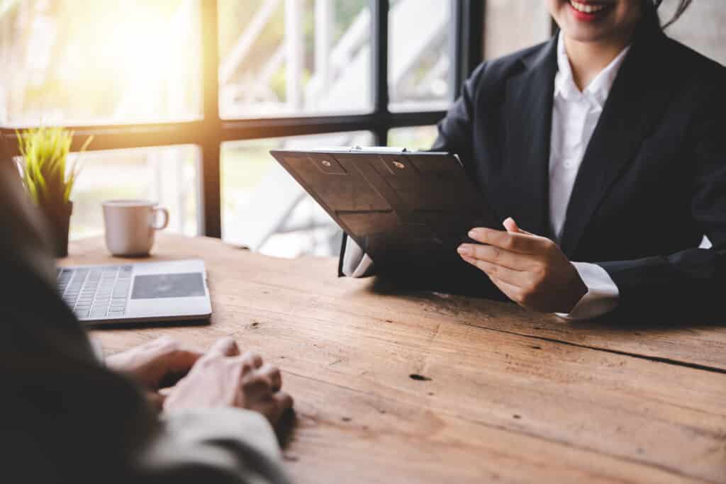 Portrait of a person interviewing for a job and
Submit resume to staff job application concept